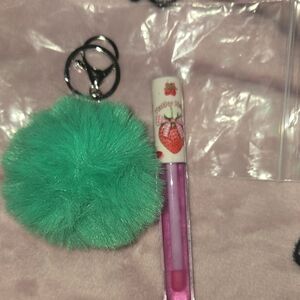 Green Fluffy Keychain with Pink Lip Gloss